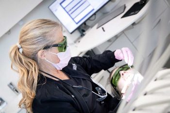Patient having laser work done in their mouth
